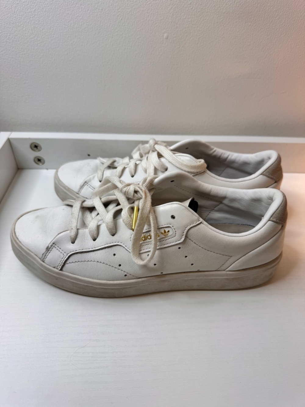 adidas White Sneakers with Gold Logo Accent